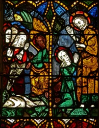 La ventana este que representa una escena de la Resurrección: las Santas Mujeres en la Tumba; ¿María Magdalena con Cristo?