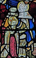 Ventana Ew que representa a Santa Ana, Joaquín, la Virgen María y el Niño Jesús