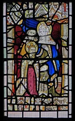 Ventana Ew que representa a Santa Ana, Joaquín, la Virgen María y el Niño Jesús