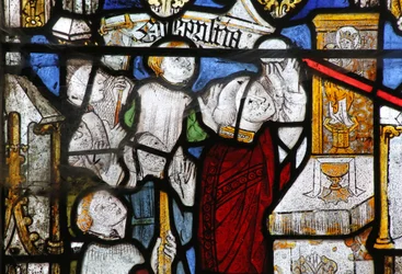 Ventana que representa los Siete Sacramentos: la Eucaristía