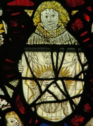 Ventana S4 que representa a un ángel sosteniendo el velo de Verónica con una imagen de la cabeza de Cristo