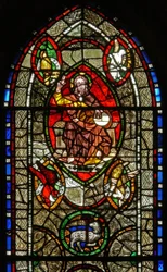 Ventana S representando a Cristo en Majestad rodeado de símbolos de los Evangelistas
