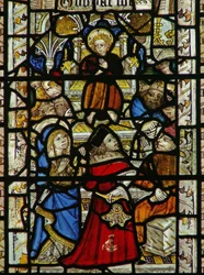 Ventana que representa a los doctores en el Templo