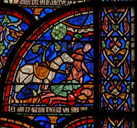 Ventana s7 que representa una escena de un milagro de Santo Tomás Becket: William de Gloucester es enterrado pero se escucha su voz