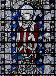 Ventana w6 que representa a San Nicolás; borde con figuras