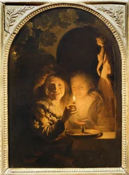 Pareja iluminada por una vela ...
