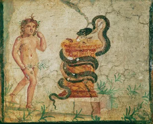 Harpócrates de pie cerca de un altar, rodeado por una serpiente