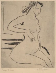 Desnudo femenino sentado