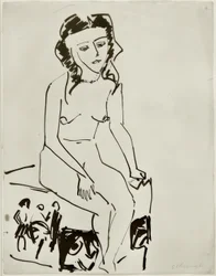 Desnudo femenino sentado