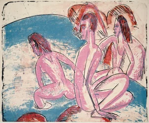 Tres bañistas junto a piedras