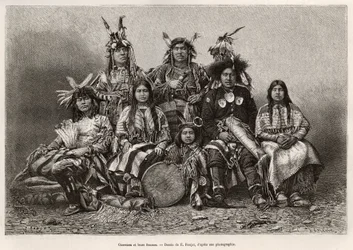 Guerreros indios y sus esposas (Texas). Grabado según el dibujo de E.Ronjat, para ilustrar la historia La conquista blanca, de William Hepworth Dixon, en 1875, publicado en Le tour du monde, 1876, editado por Edouard Charton, edición Hachette, París