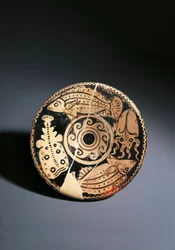 Plato de cerámica de figuras rojas con decoración de peces, de Cerveteri