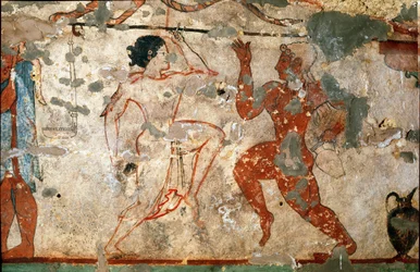 Danza ritual, joven con túnica transparente y joven desnudo. (Detalle de fresco, 520 a. C.)