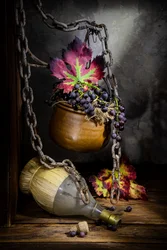 Naturaleza muerta otoñal con vino