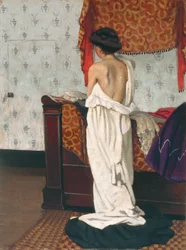 Espalda de un desnudo en un interior
