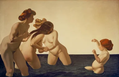 Tres mujeres y una niña pequeña jugando en el agua