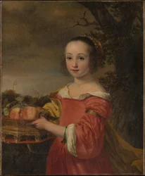 Petronella Elias con una cesta de frutas