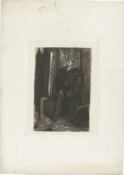 Retrato de un artista de pie detrás del caballete en el estudio