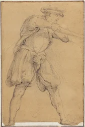 Hombre apuntando con un arma