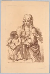 Virgen y niño sosteniendo un libro