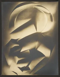 [Abstracción en papel recortado]