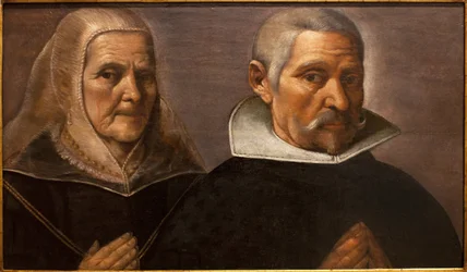 Retrato de una pareja de ancianos rezando