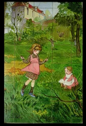 Azulejos decorados con niños jugando en un jardín (cerámica vidriada)