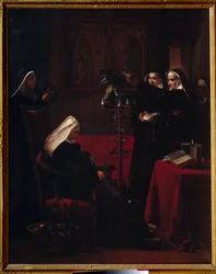 Monjas verdes dando comida al loro de una monja dormida