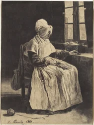 Una mujer tejiendo