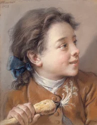 Niño con una zanahoria