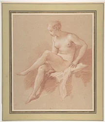 Desnudo femenino sentado