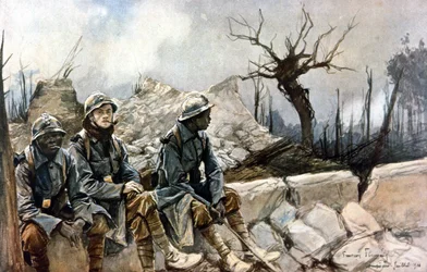 3 soldados franceses sentados delante de las ruinas de la iglesia de Dampierre. Guerra 1914 - 1918. París, Musée de l