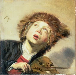 Un niño con un violín