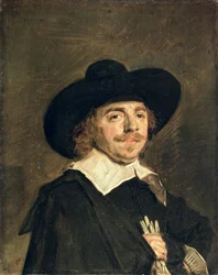 Un pequeño retrato de un hombre con guantes