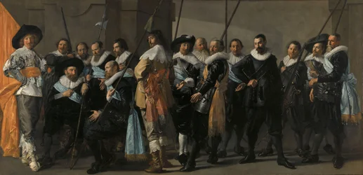 Compañía de Milicia del Distrito XI bajo el Mando del Capitán Reynier Reael, conocida como "La Compañía de la Mugre".
Oficiales y otros guardias del Distrito XI de Ámsterdam, bajo el mando del capitán Reijnier Reael y el teniente Cornelis Michielsz Blaeuw