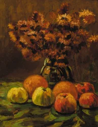 Manzanas, naranjas y un jarrón de flores en una mesa