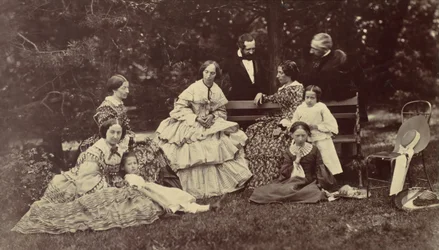[Retrato de grupo de cuatro mujeres, dos hombres y tres niños en un jardín], 1850s-60s