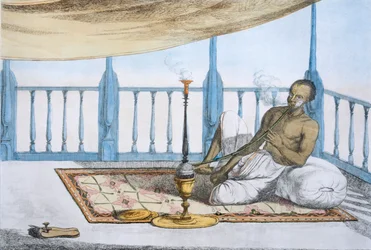 Hombre fumando una pipa de hachís u opio, pub. 1808-12