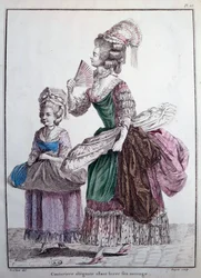 Moda del siglo XVIII: una diseñadora elegante entregando su trabajo, una enagua adornada con ballenas usadas para sostener el vestido de las mujeres. Grabado de 1778 París, artes decorativas