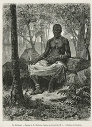 Un feticheur, hechicero capaz de utilizar la fuerza mágica de los fetiches, dibujo de D.Maillart, para ilustrar el relato de un viaje a Gabón y al río Ogoue, en 1875-1877, de Alfred Marche. Grabado en Le tour du monde