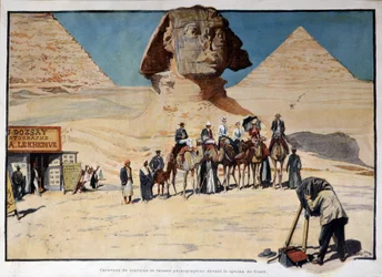 Caravana de turistas siendo fotografiada frente a la esfinge de Gizeh (Guiseh, Giza, Giza)