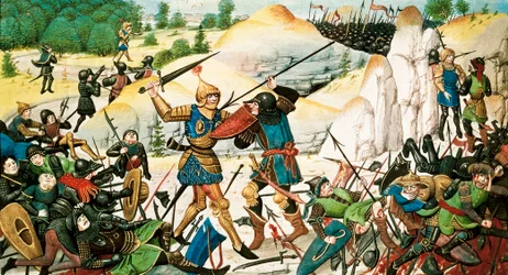 Muerte del caballero Roldán, sobrino de Carlomagno, en la batalla de Roncesvalles (778) entre el ejército de Carlomagno y los sarracenos. Miniatura del siglo XIV