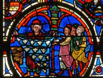 (detalle) de una ventana que representa la Pasión: donantes y los peleteros