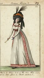 Mujer a la moda con abanico y gran peinado y sombrero