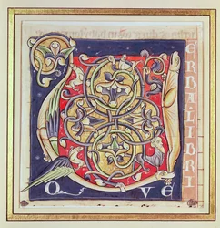 Inicial historiada U con un patrón entrelazado y animales fantásticos, de la Biblia de Saint-Andre aux-Bois