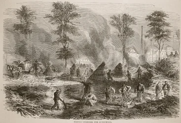 Fabricando carbón para pólvora, ilustración de la Historia de la Guerra entre Francia y Alemania, 1870-1871