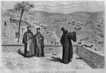 Monje alimentando pájaros, monasterio de Marsaha, de La Syrie daujourdhui. Voyages dans la Phenicie le Liban et la Judee. 1875-1880 de Louis Charles Emile Lortet, 1884