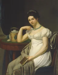 Retrato de una mujer en un interior con una cesta de trabajo