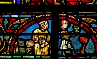 La ventana de San Lubin: donantes - vinateros: él sirve el vino, ella sostiene la bolsa de dinero