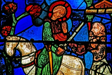 Ventana de San Martín: el santo divide su manto
